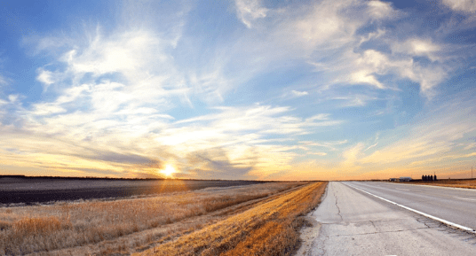 image of prairie highway at sunset